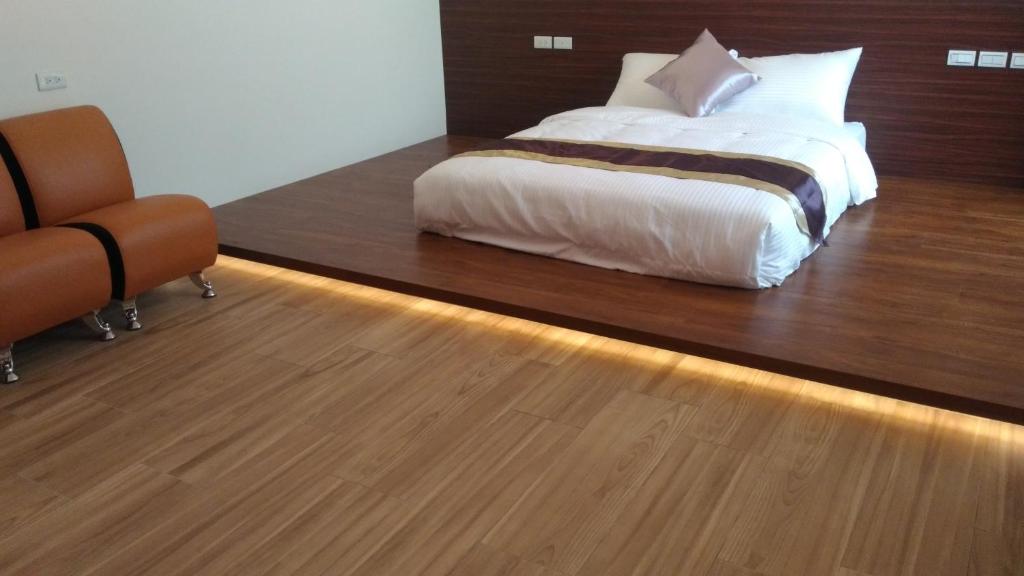Postel nebo postele na pokoji v ubytování Purple Shell Homestay II