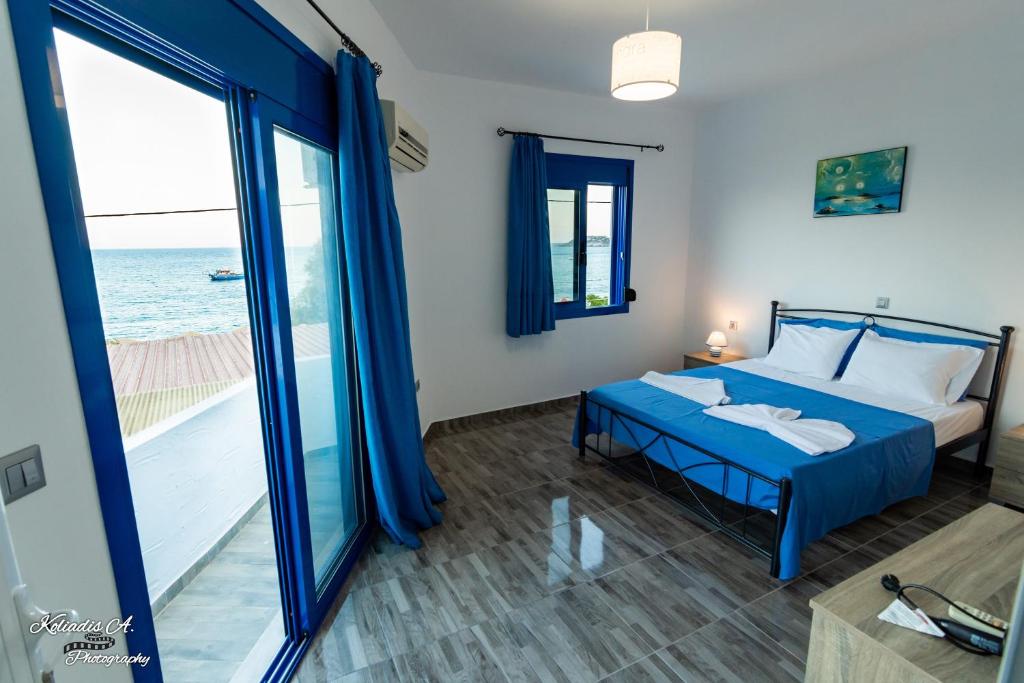 Postel nebo postele na pokoji v ubytování Riva Del Mare