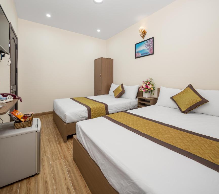 Postel nebo postele na pokoji v ubytování Fuji Hostel