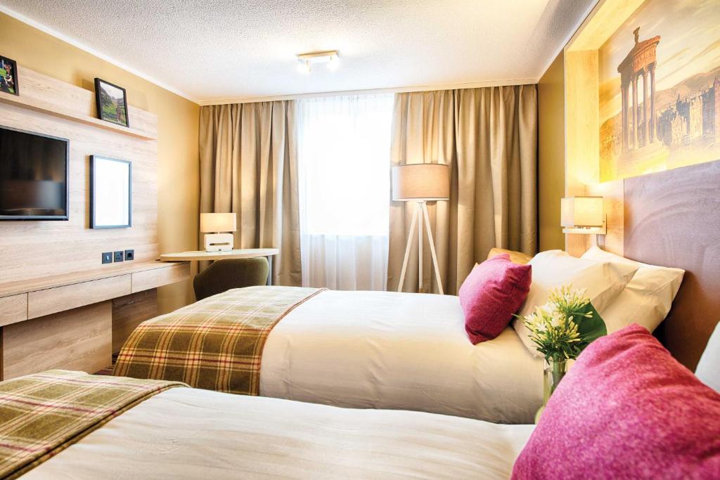 Leonardo Hotel Edinburgh Haymarketにあるベッド