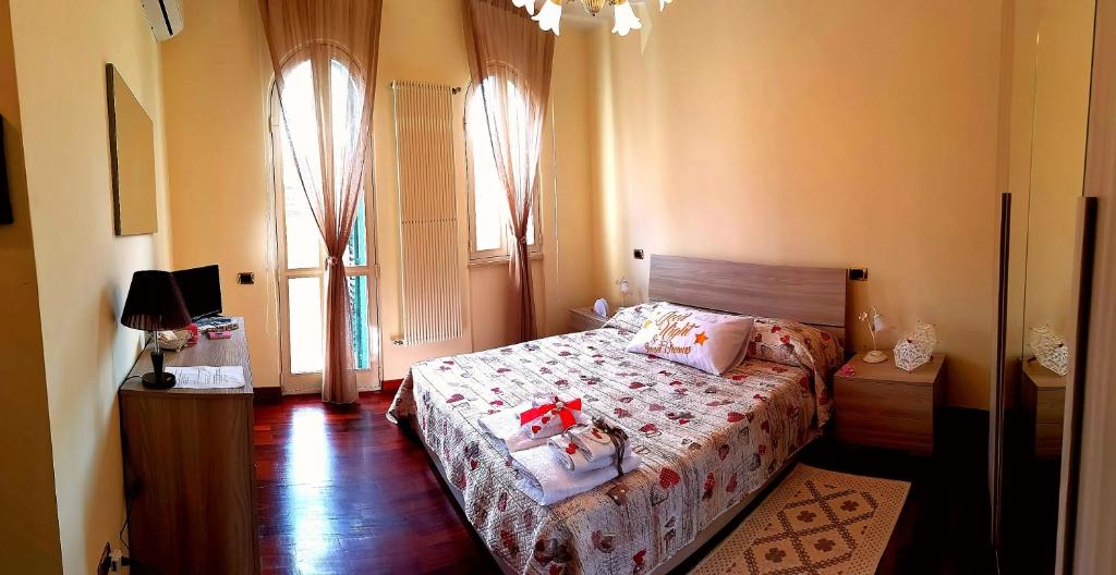 Un pat sau paturi într-o cameră la FioreStella