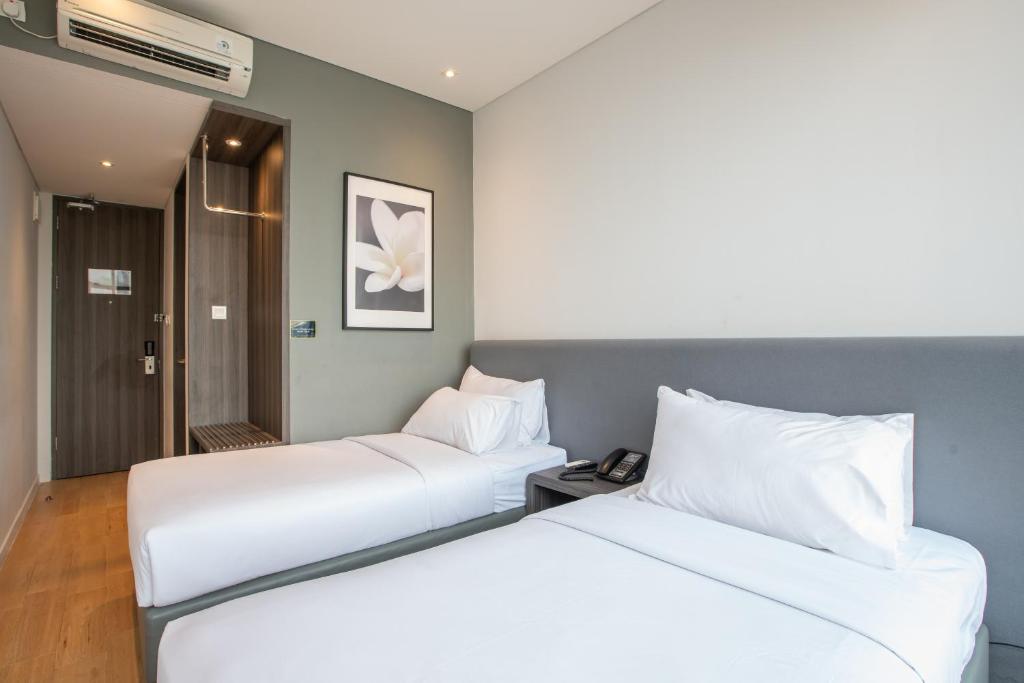 Juno Tanah Abang Jakarta - Deluxe Twin Room