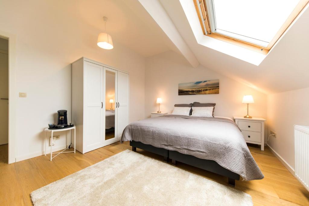 Postel nebo postele na pokoji v ubytování B&B Daya