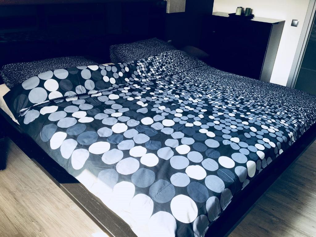 Posteľ alebo postele v izbe v ubytovaní Apartament Ala