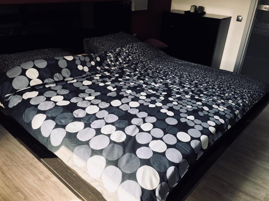 Posteľ alebo postele v izbe v ubytovaní Apartament Ala