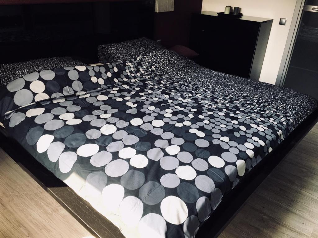 Posteľ alebo postele v izbe v ubytovaní Apartament Ala