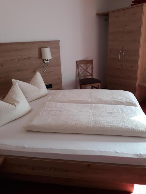 Postel nebo postele na pokoji v ubytování Bauernhof Kotz