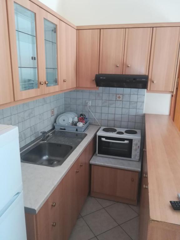 Kuchyň nebo kuchyňský kout v ubytování Iliana