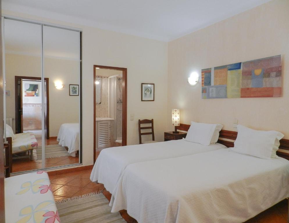 Postel nebo postele na pokoji v ubytování Residencia Julio