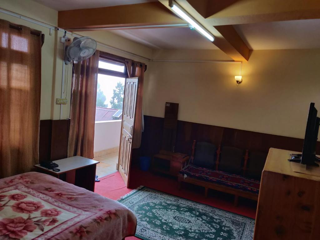 Voodi või voodid majutusasutuse Deki Lodge toas