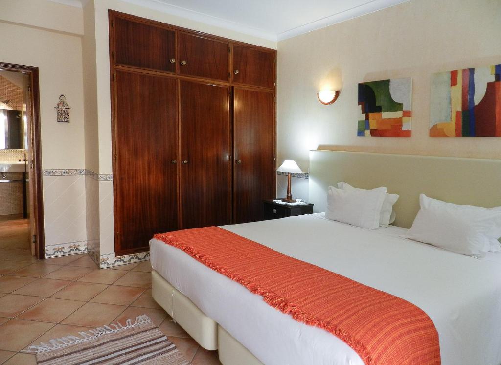 Postel nebo postele na pokoji v ubytování Residencia Julio