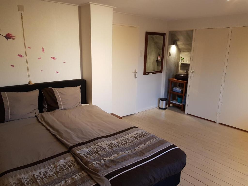 Postel nebo postele na pokoji v ubytování Bed en Breakfast Molenzicht