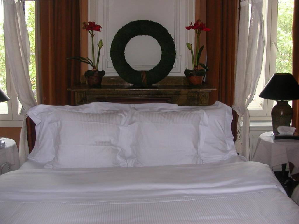 Postel nebo postele na pokoji v ubytování Hotel Recour