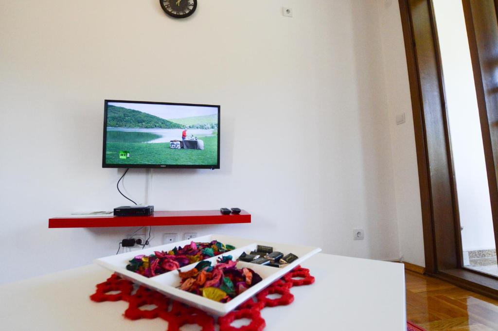 TV a/nebo společenská místnost v ubytování Apartment Holiday