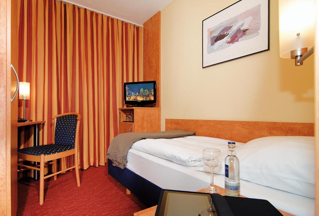 Postel nebo postele na pokoji v ubytování Hotel Ostmeier