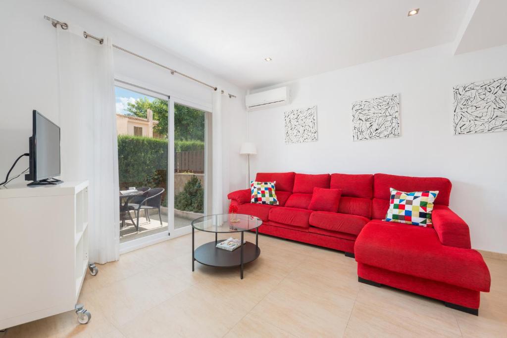 TV a/nebo společenská místnost v ubytování Villa JERONIMO Alcudia by Mallorca Villa Selection