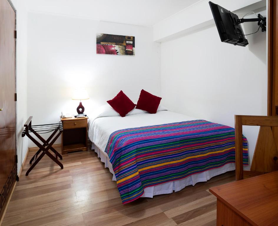 Postel nebo postele na pokoji v ubytování Hotel Samaña