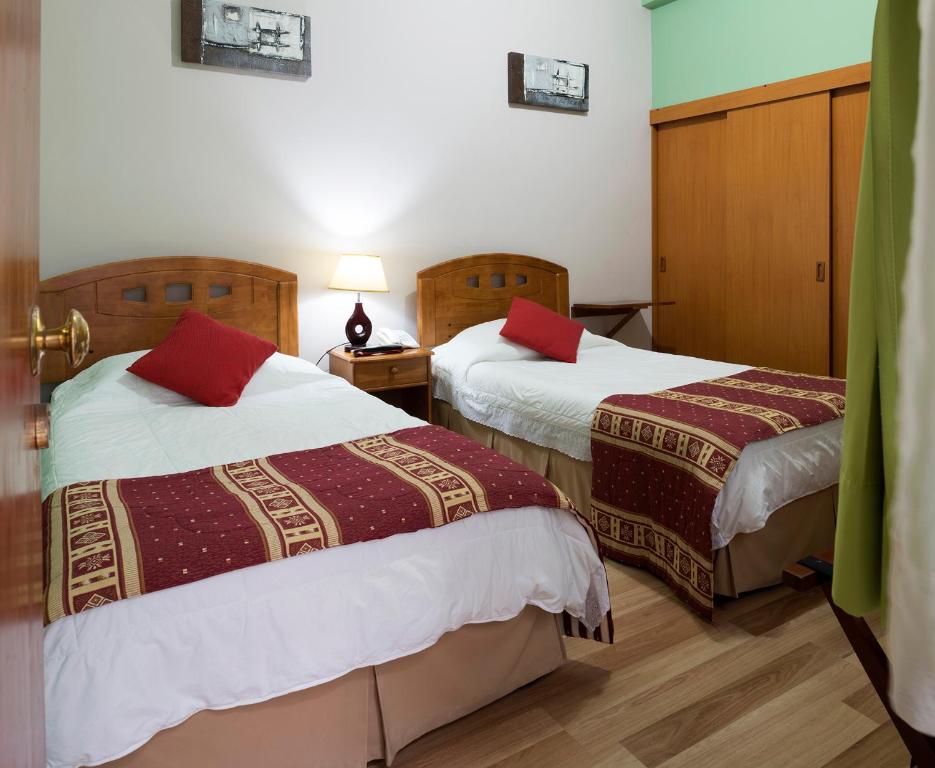 Postel nebo postele na pokoji v ubytování Hotel Samaña