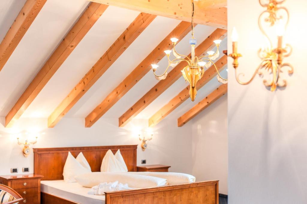 Postel nebo postele na pokoji v ubytování Hotel Lambrechtshof