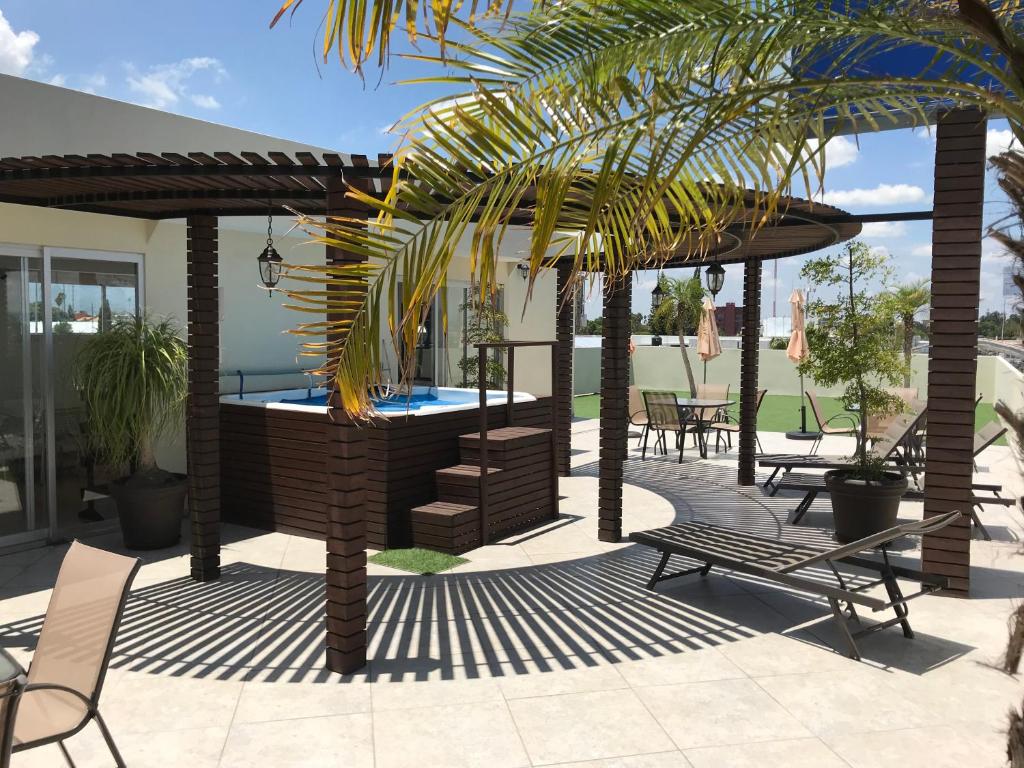 Patio nebo venkovní prostory v ubytování My Home Suites