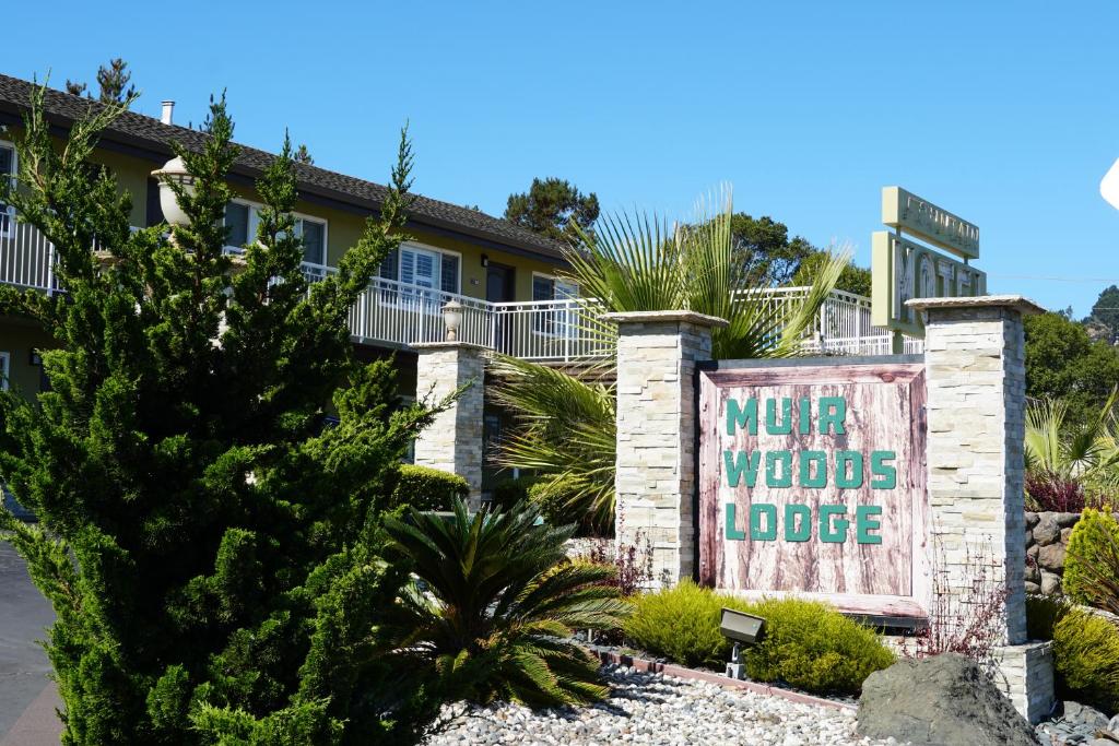 a building with a sign that reads motel welded loose at Muir Woods Lodge in Mill Valley