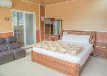 Postel nebo postele na pokoji v ubytování Mingyuan Homestay