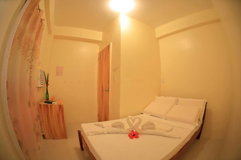 Postel nebo postele na pokoji v ubytování Baletin Hometel