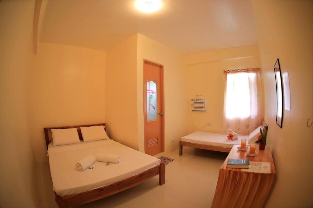 Postel nebo postele na pokoji v ubytování Baletin Hometel