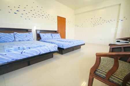 Postel nebo postele na pokoji v ubytování HaiAn Xian Homestay