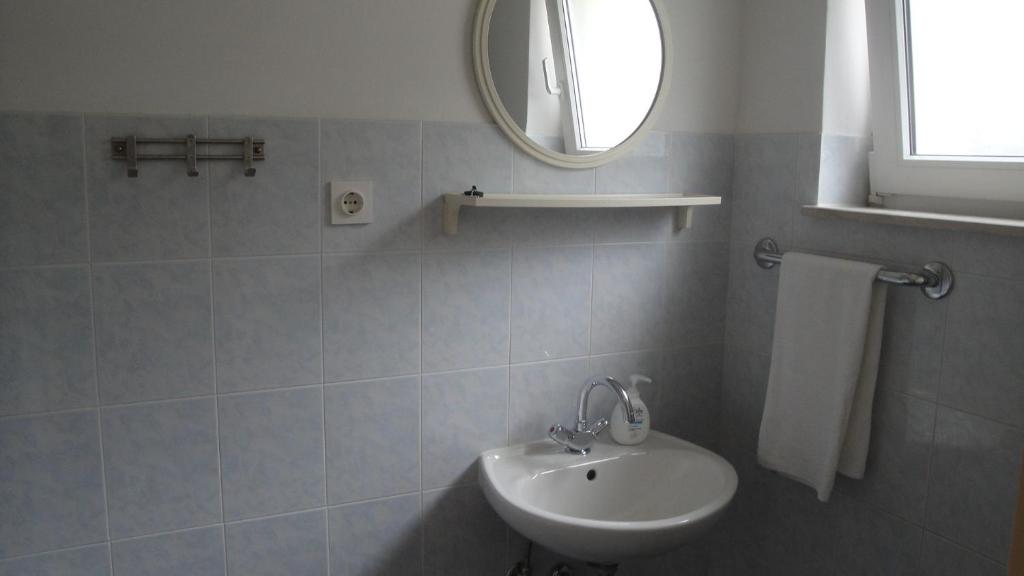 Kúpeľňa v ubytovaní Apartments and Rooms Denis