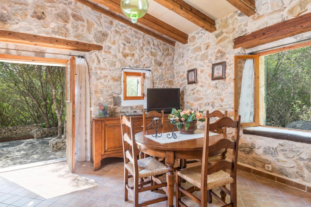 TV a/nebo společenská místnost v ubytování Casa De Piedra