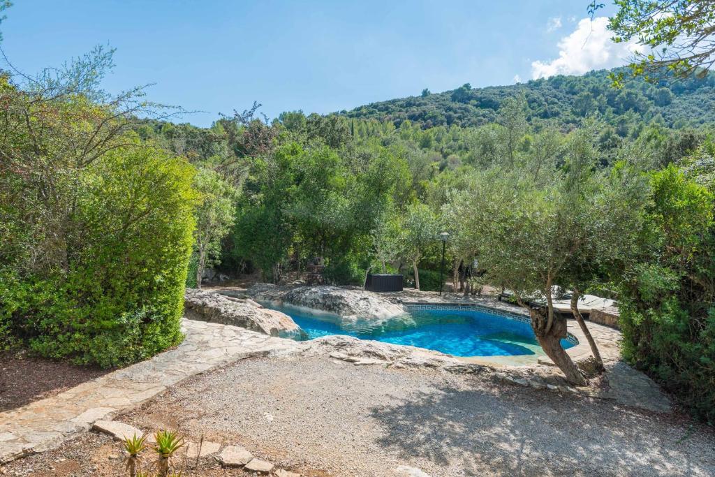Bazén v ubytování Casa De Piedra nebo v jeho okolí