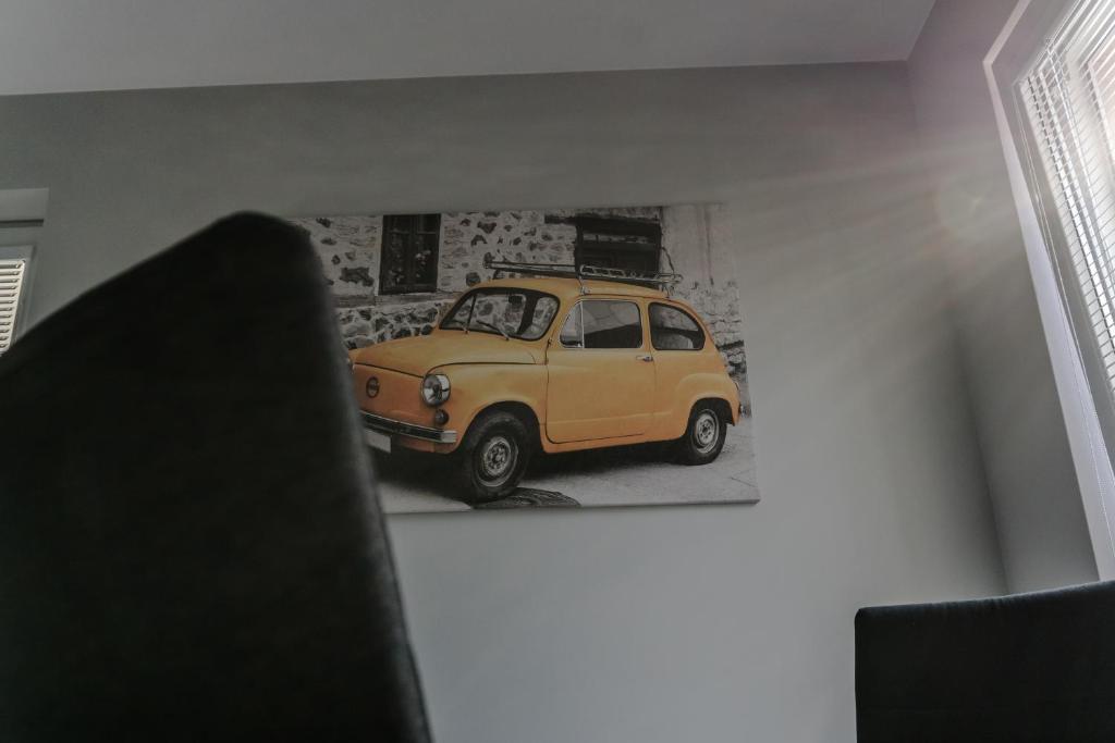 TV a/nebo společenská místnost v ubytování Apartamenty Tychy Barona