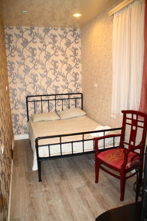 Postel nebo postele na pokoji v ubytování MGA Hostel & Tours