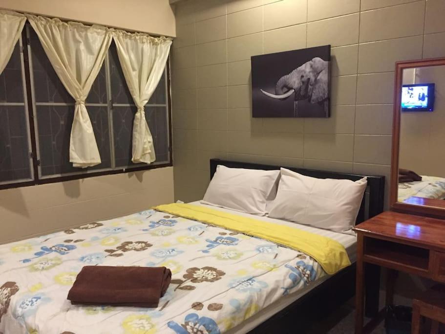 Postel nebo postele na pokoji v ubytování Nett Hotel