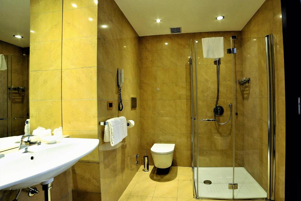 Koupelna v ubytování Hotel Pierre Milano