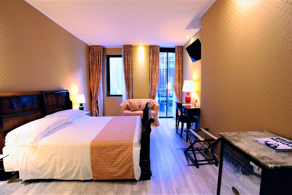 Postel nebo postele na pokoji v ubytování Hotel Pierre Milano