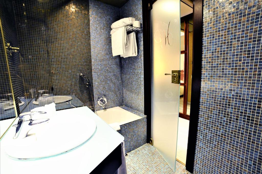 Koupelna v ubytování Hotel Pierre Milano