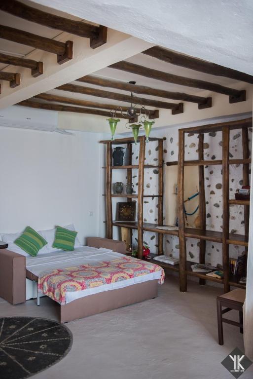 Posteľ alebo postele v izbe v ubytovaní Komissa΄s Beach House