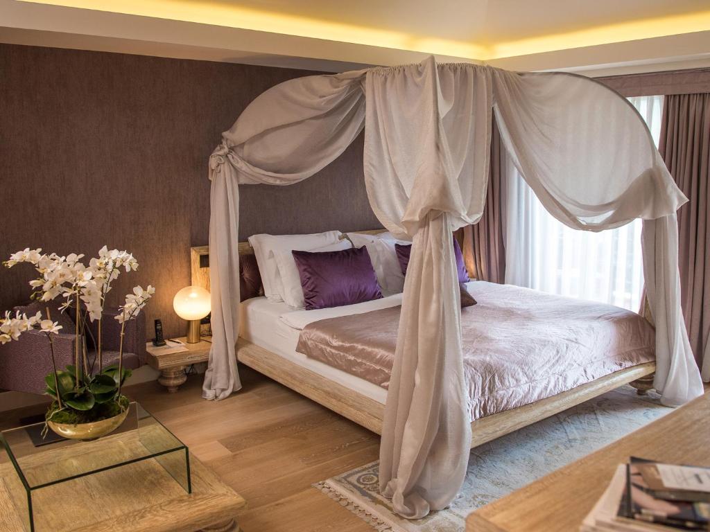 Postel nebo postele na pokoji v ubytování Hotel Forza Mare