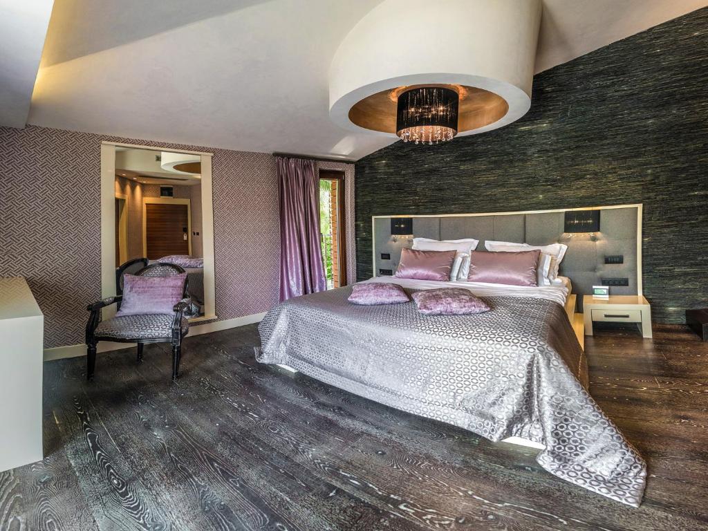 Postel nebo postele na pokoji v ubytování Hotel Forza Mare