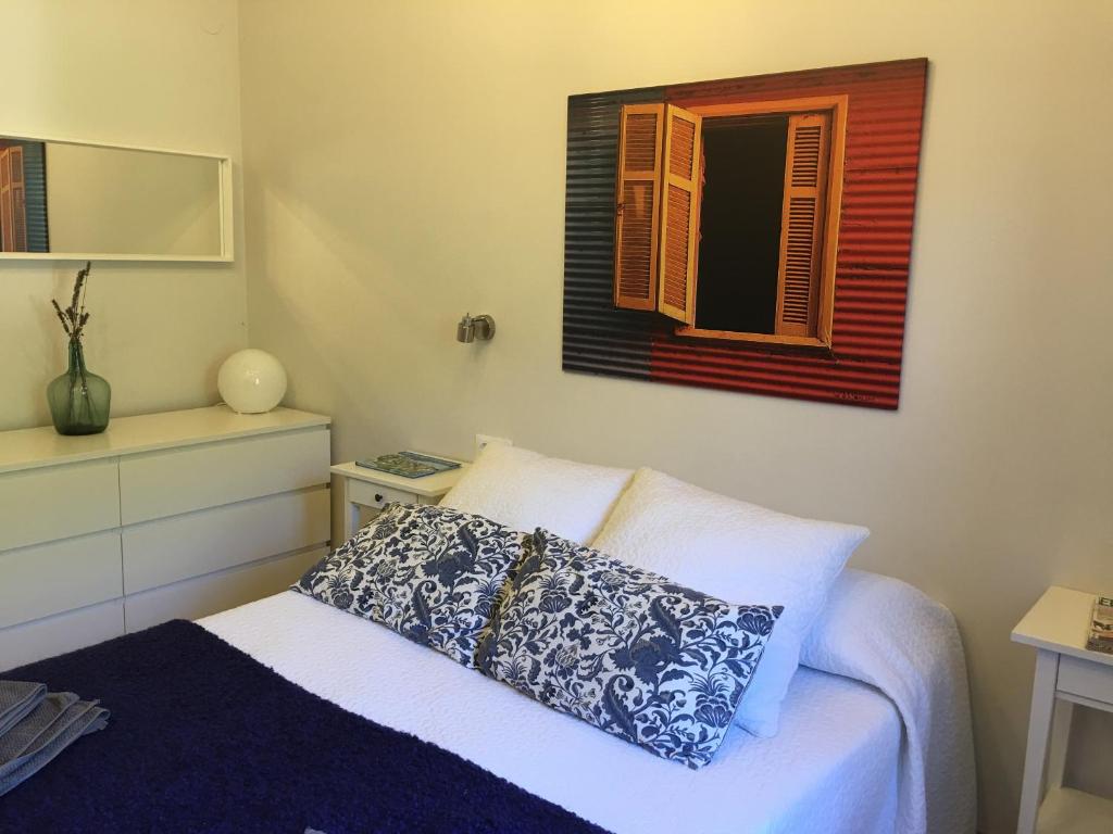A bed or beds in a room at Excepcional Apartamento El Olivo