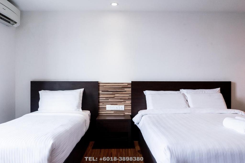 Postel nebo postele na pokoji v ubytování Classy Studio Apartment (KBCP)