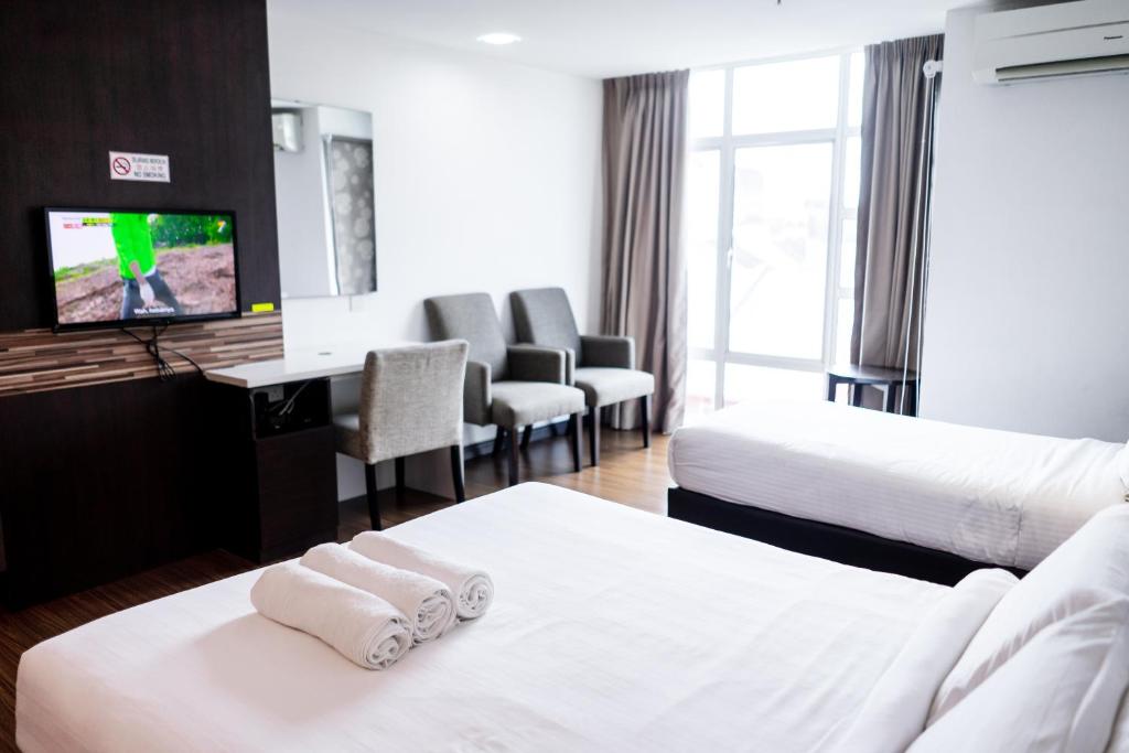 Postel nebo postele na pokoji v ubytování Classy Studio Apartment (KBCP)