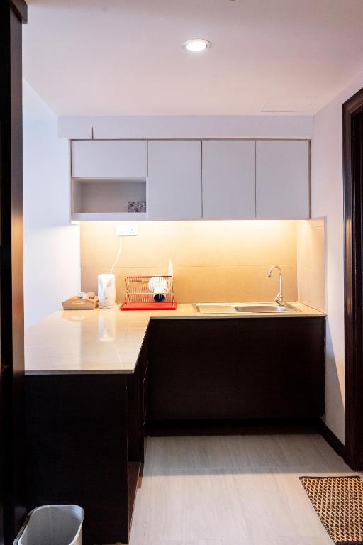 Kuchyň nebo kuchyňský kout v ubytování Classy Studio Apartment (KBCP)
