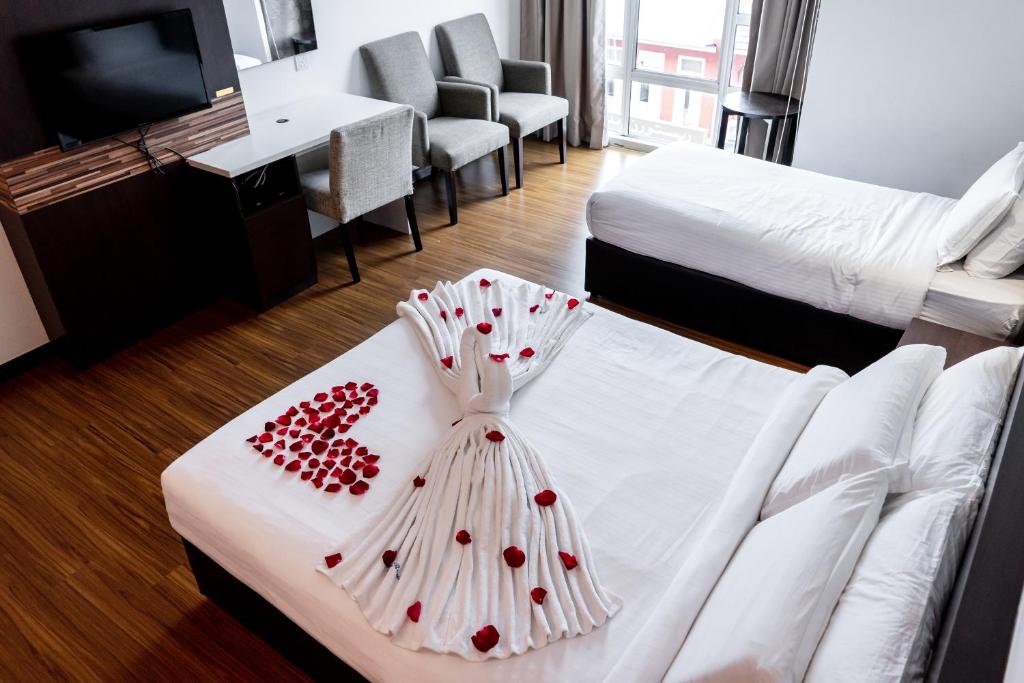 Postel nebo postele na pokoji v ubytování Classy Studio Apartment (KBCP)