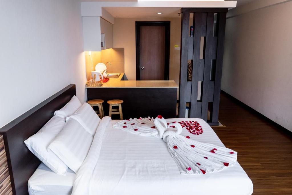 Postel nebo postele na pokoji v ubytování Classy Studio Apartment (KBCP)