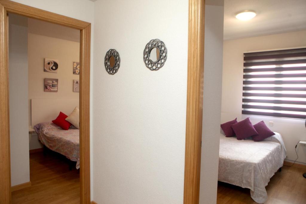 Posteľ alebo postele v izbe v ubytovaní Apartamento Castilla