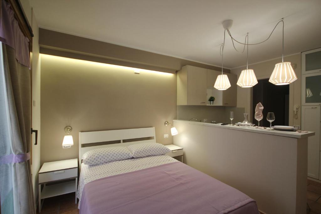 Postel nebo postele na pokoji v ubytování B&b Cortile Aurora