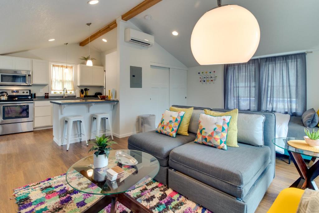 a living room with a couch and a table at New Portland Neighborhood Studio in Portland